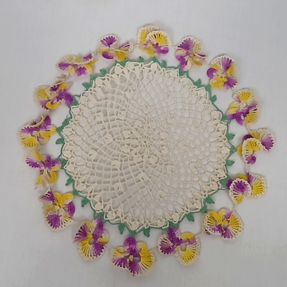 Vintage purple and yellow pansy crochet doily